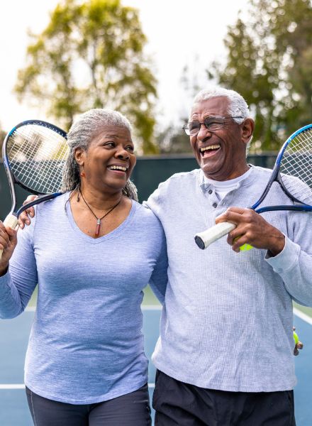 couple enjoying tennis