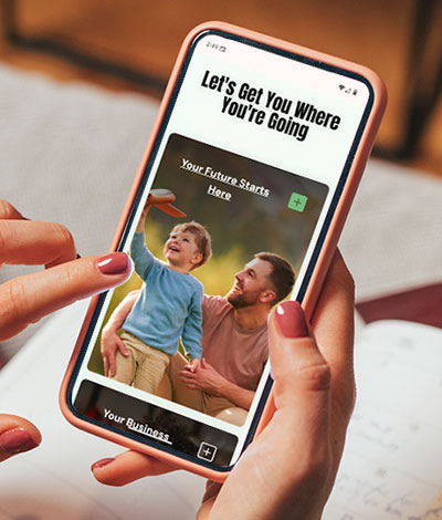 Person using a phone to look at the new cs.bank website