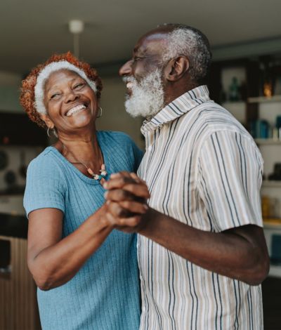 Couple dancing in kitchen