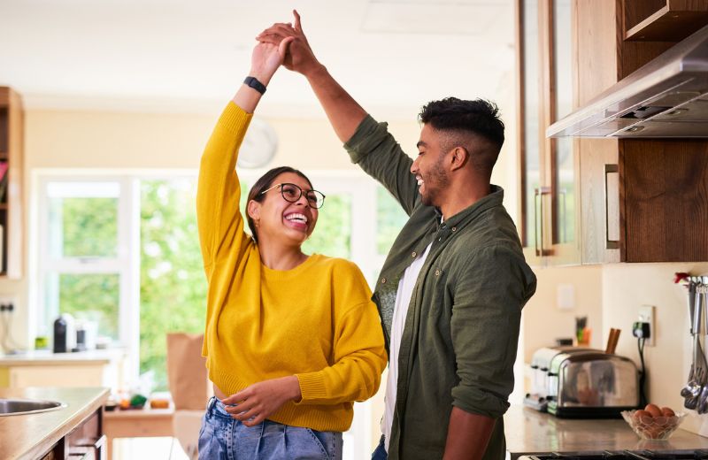 Couple spinning - Savings hero image