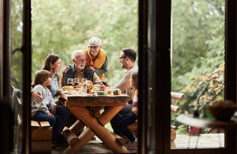family gathered on back deck