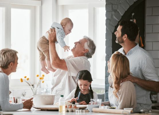 Family enjoying time with new baby