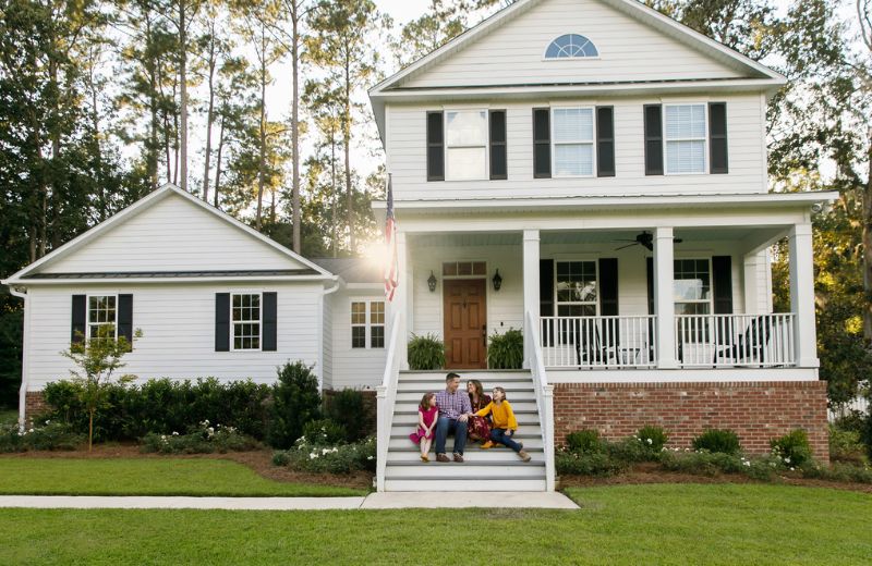 Jumbo Loans family in front of house