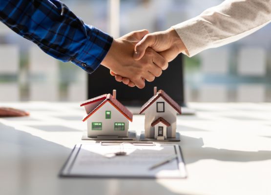 Shaking hands over a new home loan