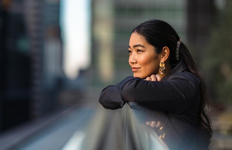 Woman looking into the distance outdoors