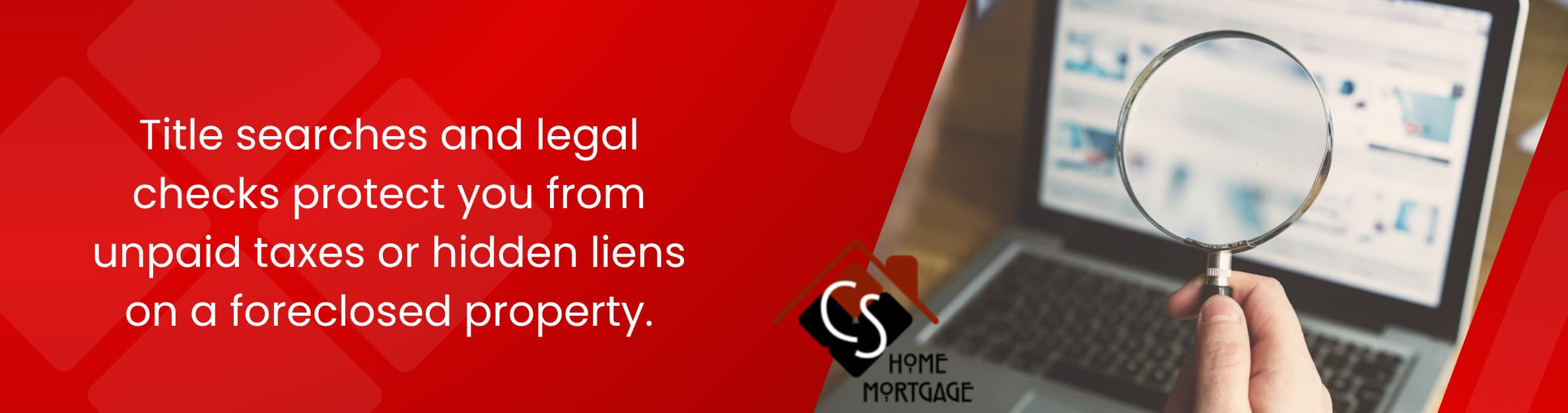 a laptop on a desk and someone is holding a magnifying glass to the screen