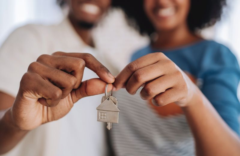 Home Owners holding new key